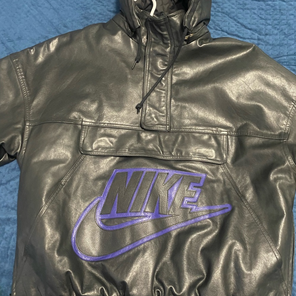 Nike Men's Black Windbreaker with Purple Logo
